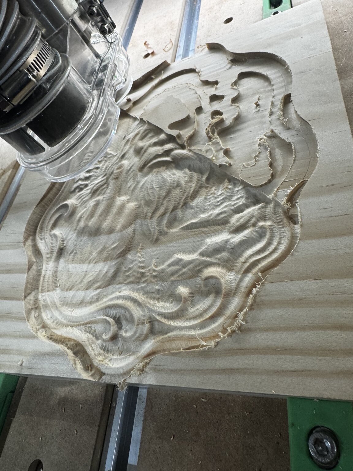 Close view of a detailed face relief being carved